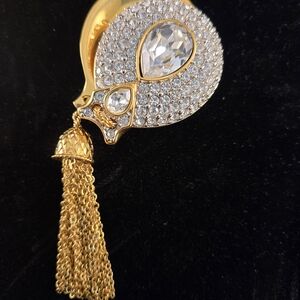 Elegant Gold and Silver Crystal Tassel Brooch